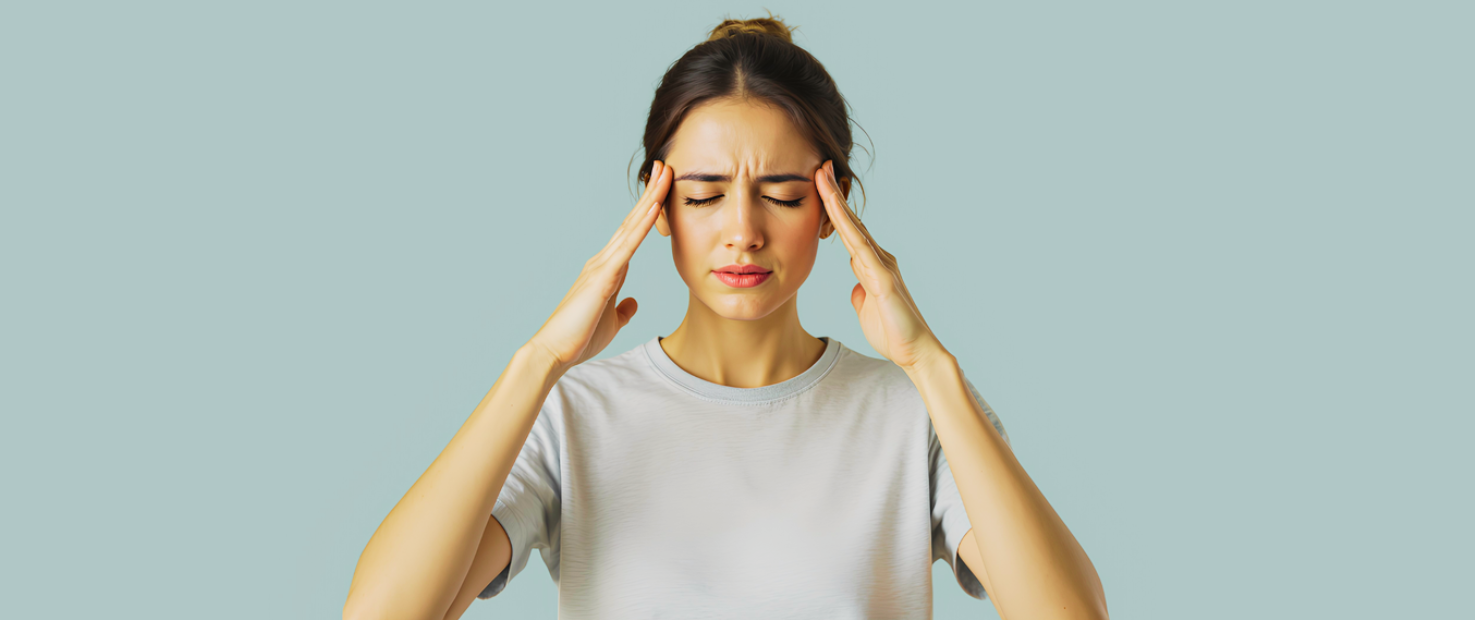 Patient experiencing neck and headache pain